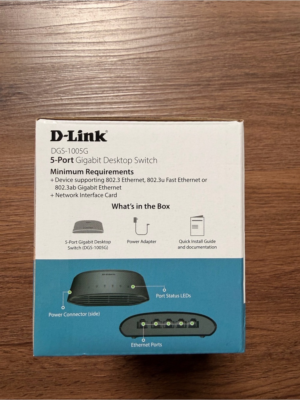 D-Link 5-Port Gigabit Desktop Switch in White and Teal/Black Accents